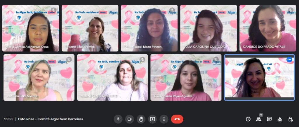 Print de uma chamada no Google Meet. Na imagem, têm várias mulheres, associadas da Algar Tech, vestindo blusas na cor rosa e com um fundo de tela igual, com cor predominantemente branca.